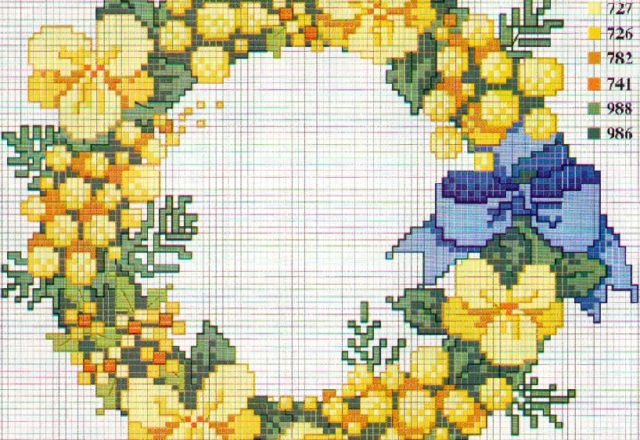 Crown of yellow flowers and blue bow cross stitch pattern