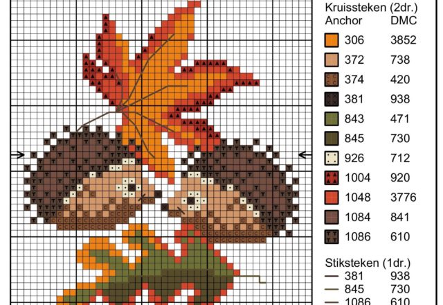 Two hedgehogs with autumn brown leaves